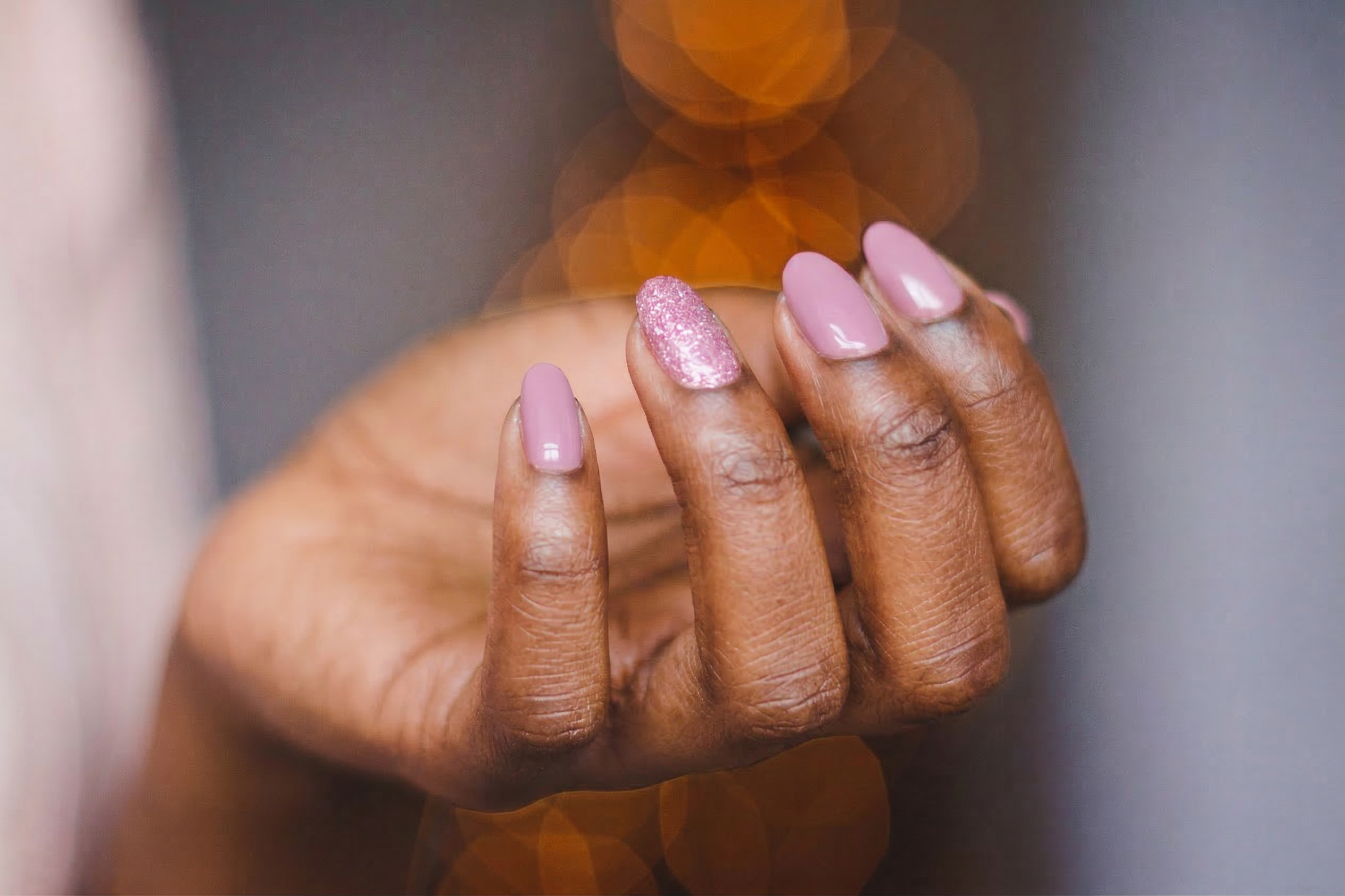 Professional press-on nails on Black hands